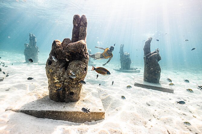 5-in-1 Cancun Snorkeling Tour with Sea Life & Transport Included - A shipwreck with white sand and clear water